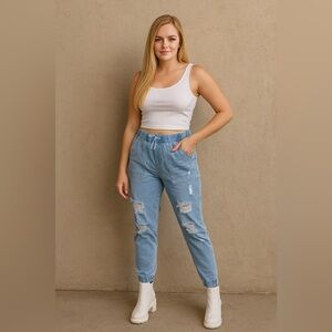 Women’s distressed denim joggers size small